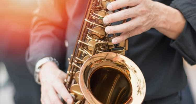 A musician playing a saxophone at the Chicago Jazz Festival