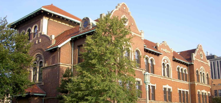 exterior of an old brick building on the Loyola University campus