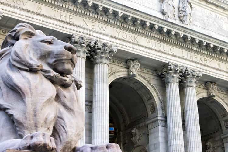 majestic lion statue outside of the new york public library main entrance