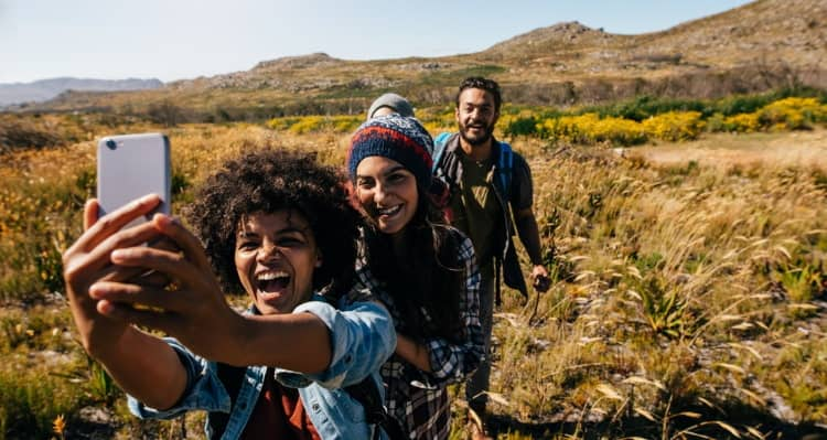 People taking a selfie in nature