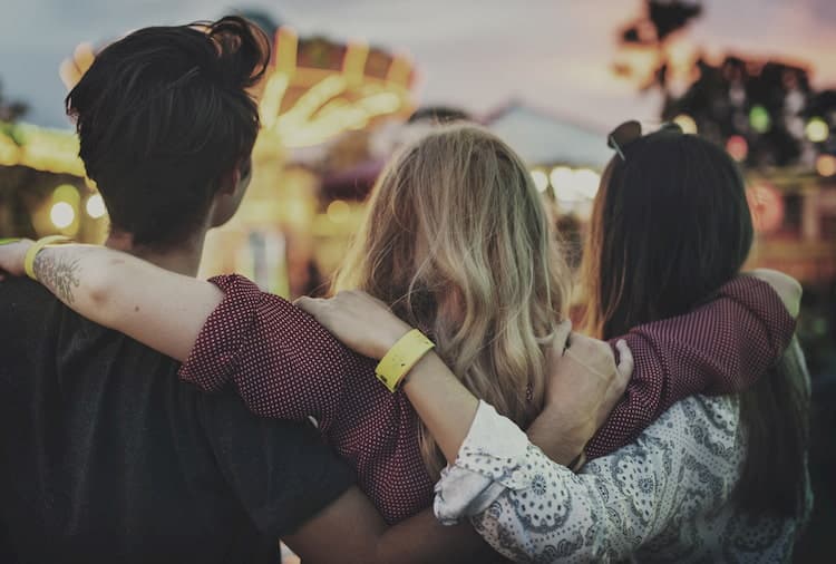 Group embracing each other at Six Flags