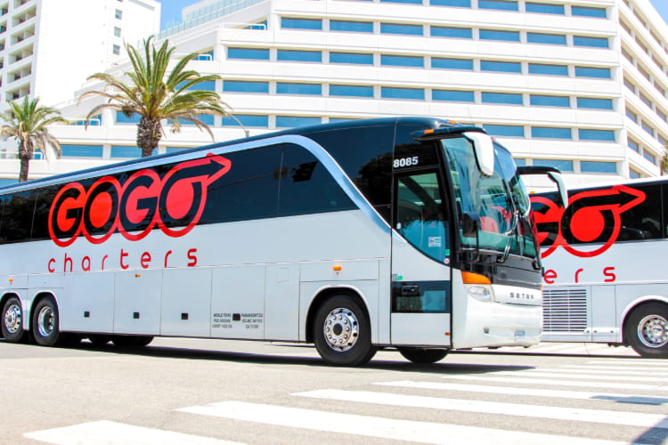 a bus prepares for departure on a team-building trip