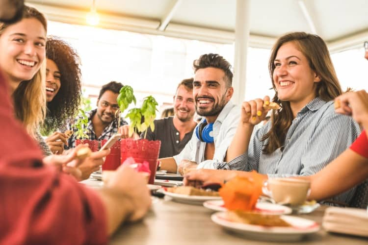 College students eating food and socializing