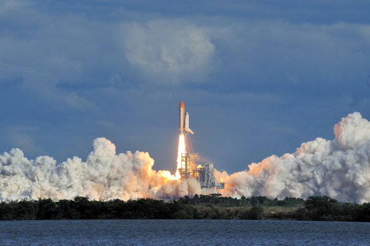 space shuttle atlantis launches from the kennedy space center