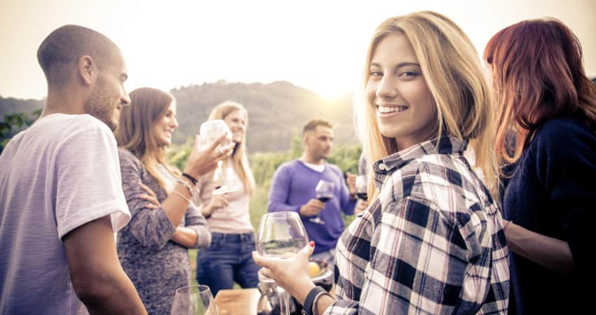 A group of friends having wine in Temecula Wine Country