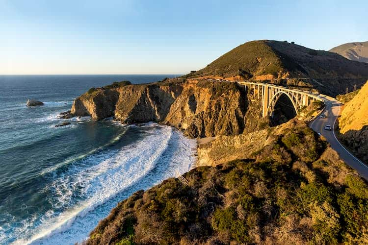 Pacific Coast Highway running past ocean