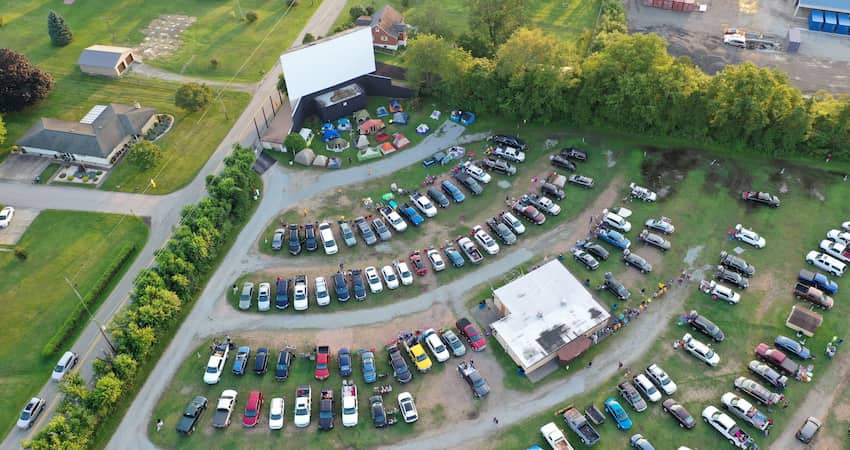 aerial view of a drive-in theatre lot full of cars