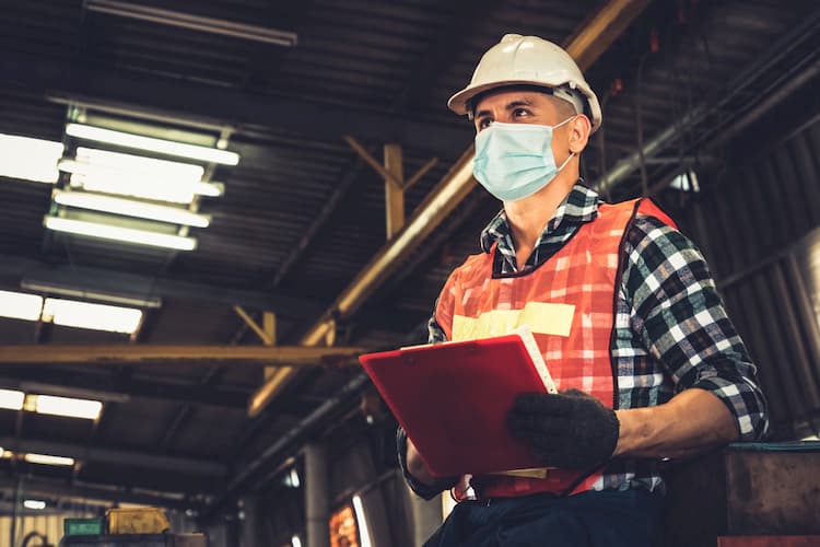 Factory supervisor in mask