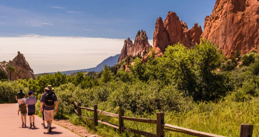 A group of people walking a trail in Garden of the Gods in Colorado Springs