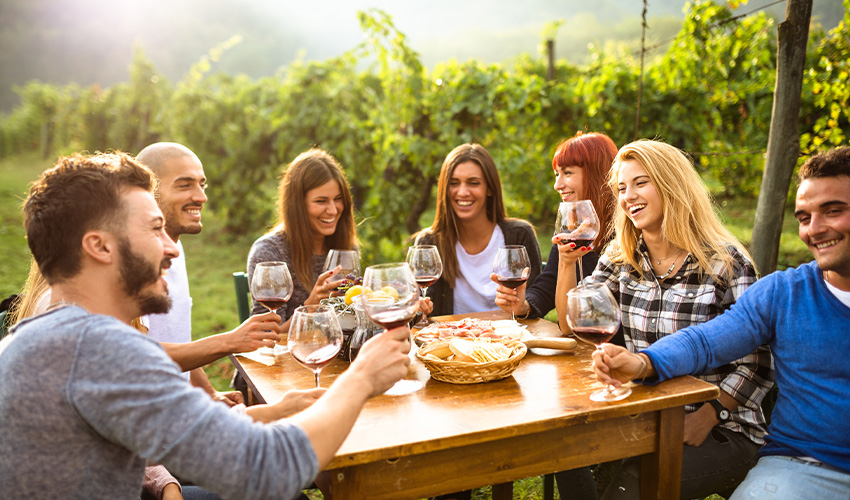 group of people enjoying a wine tasting event