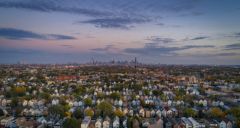 Aerial view of Chicago suburban neighborhood with Chicago skyline in the distance