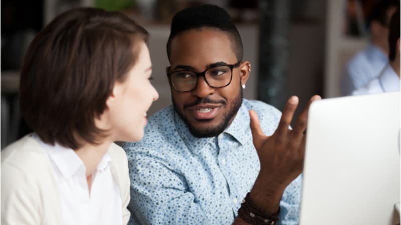 two colleagues talking at their Chicago office