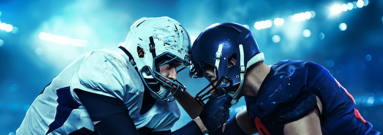 two football players head-to-head with a smoky background