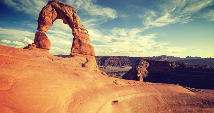 an arch at Arches National Park at dusk