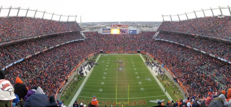 fans pack the stands at a denver broncos game