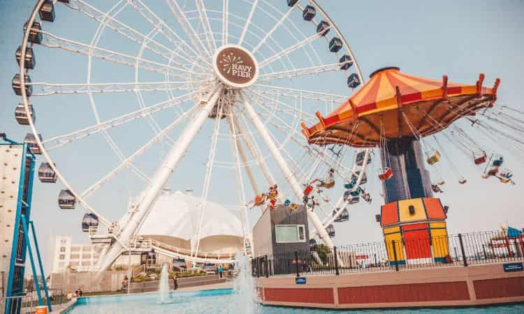 ferris wheel and swing at navy pier in chicago