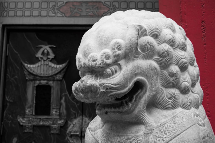 A statue of a lion outside the TCL Chinese Theatre