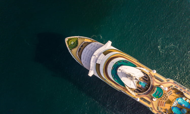 A cruise ship viewed from above in an open ocean