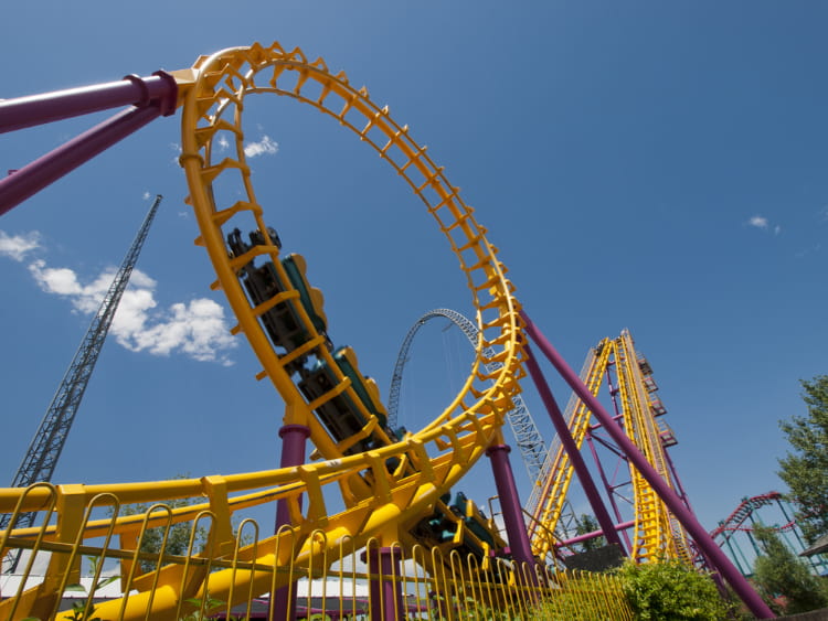 a rollercoaster finishes a loop at elitch gardens