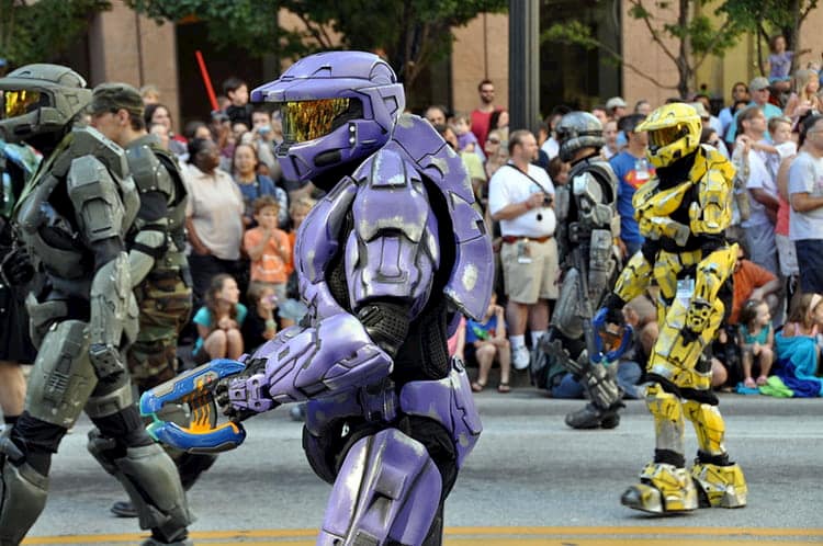a person in a robotic cosplay in dragon con's parade