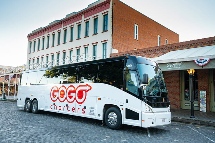 Full-size motorcoach parked on a street