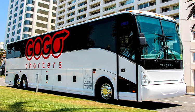 a bus from gogo charters prepares for a trip