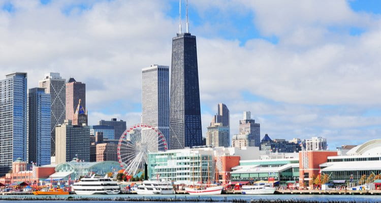 a view of navy pier and the chicago skyline from the water