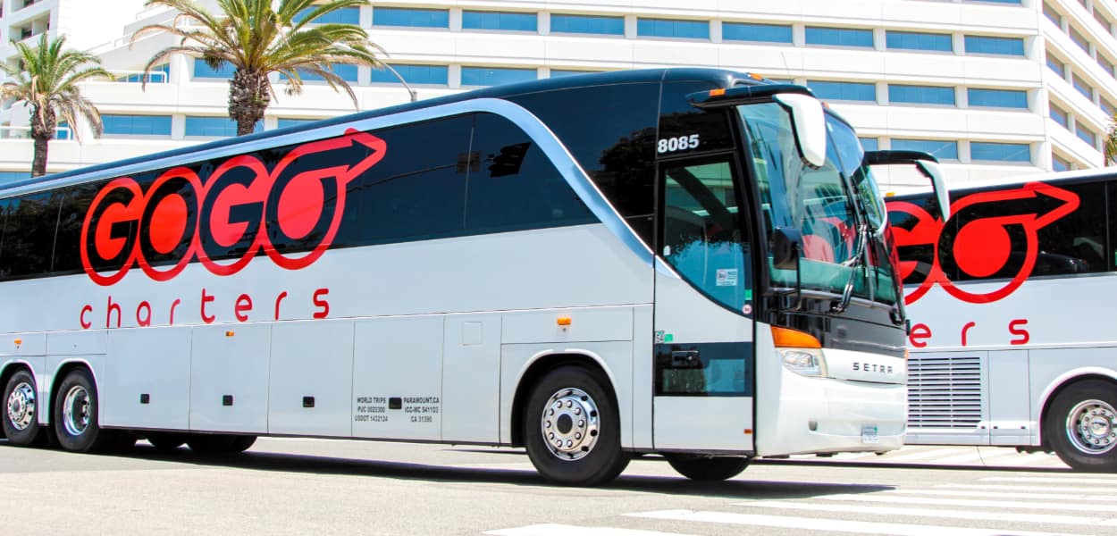 a charter bus with the GOGO Charters logo on the ride