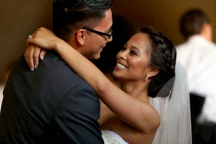 Bride and groom dancing together