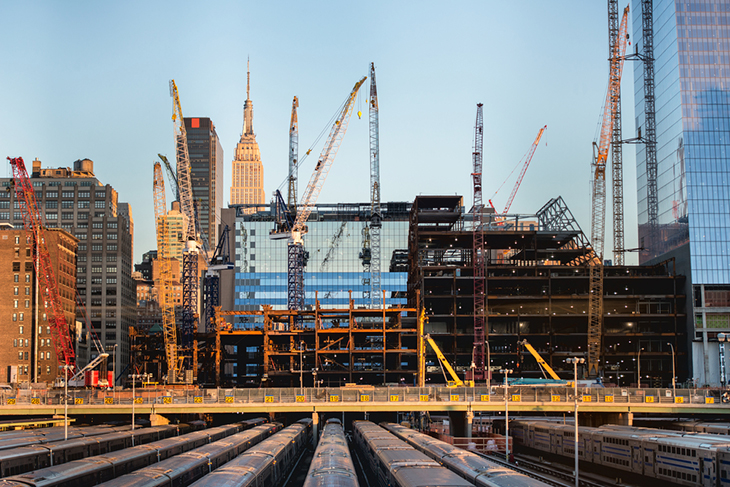 New York City skyline under construction with dozens of cranes