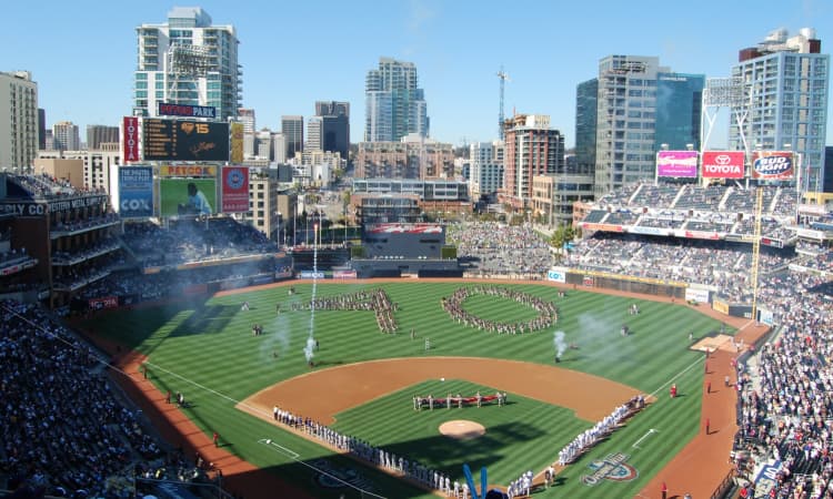 Crowds gather on the field at Petco Park for an anniversary event