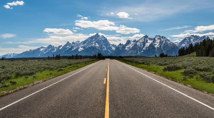 A road surrounded by mountains in Denver, Colorado