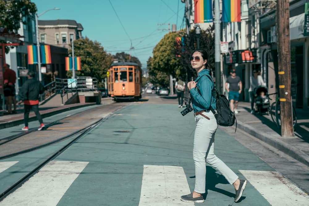 woman goes for a walk in castro