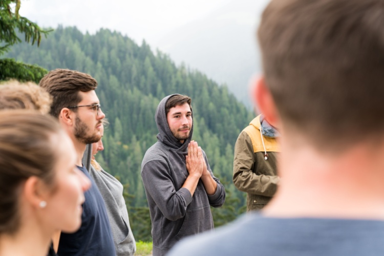 a group of campers stand outside at church camp