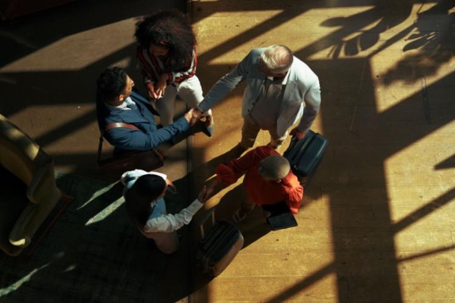 aerial view of employees shaking hands