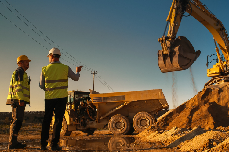 two workers at a construction site