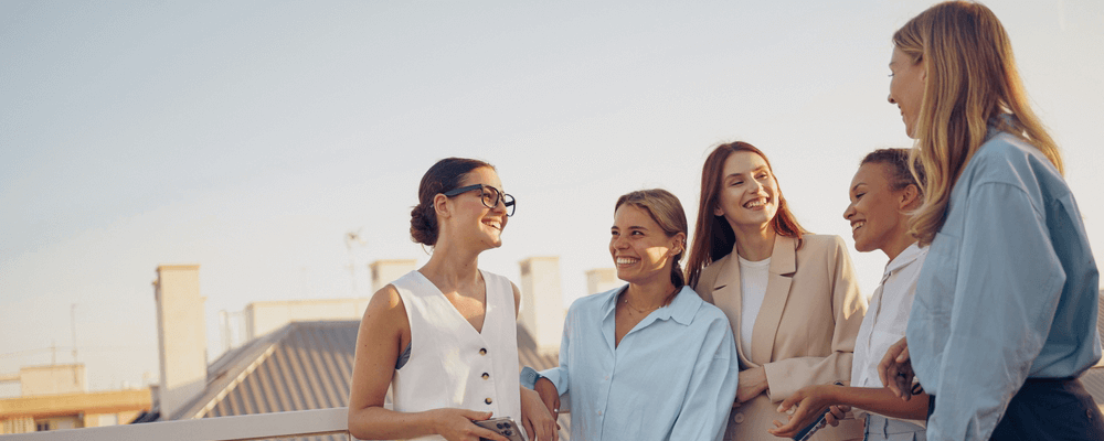 a group of business women talking