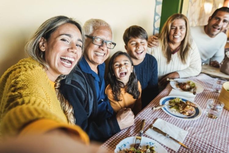 family members smile during a reunion