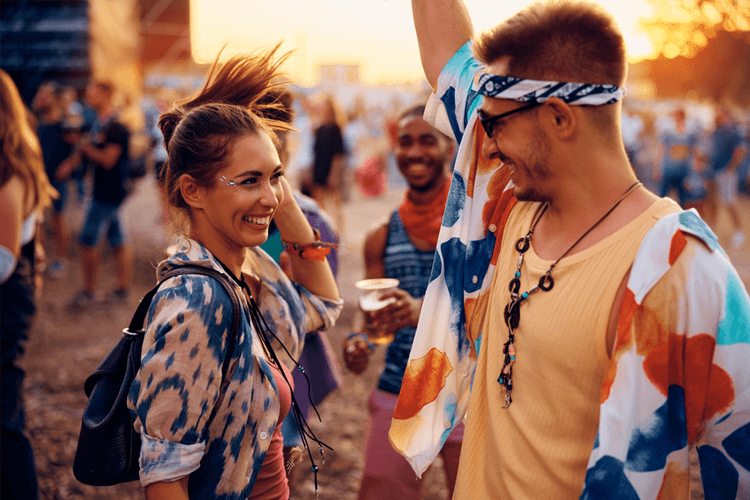 two young people at a music festival