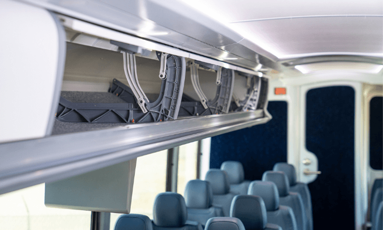 overhead bin storage aboard a charter bus