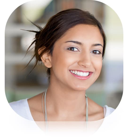 smiling woman in relaxed professional atmosphere testimonial